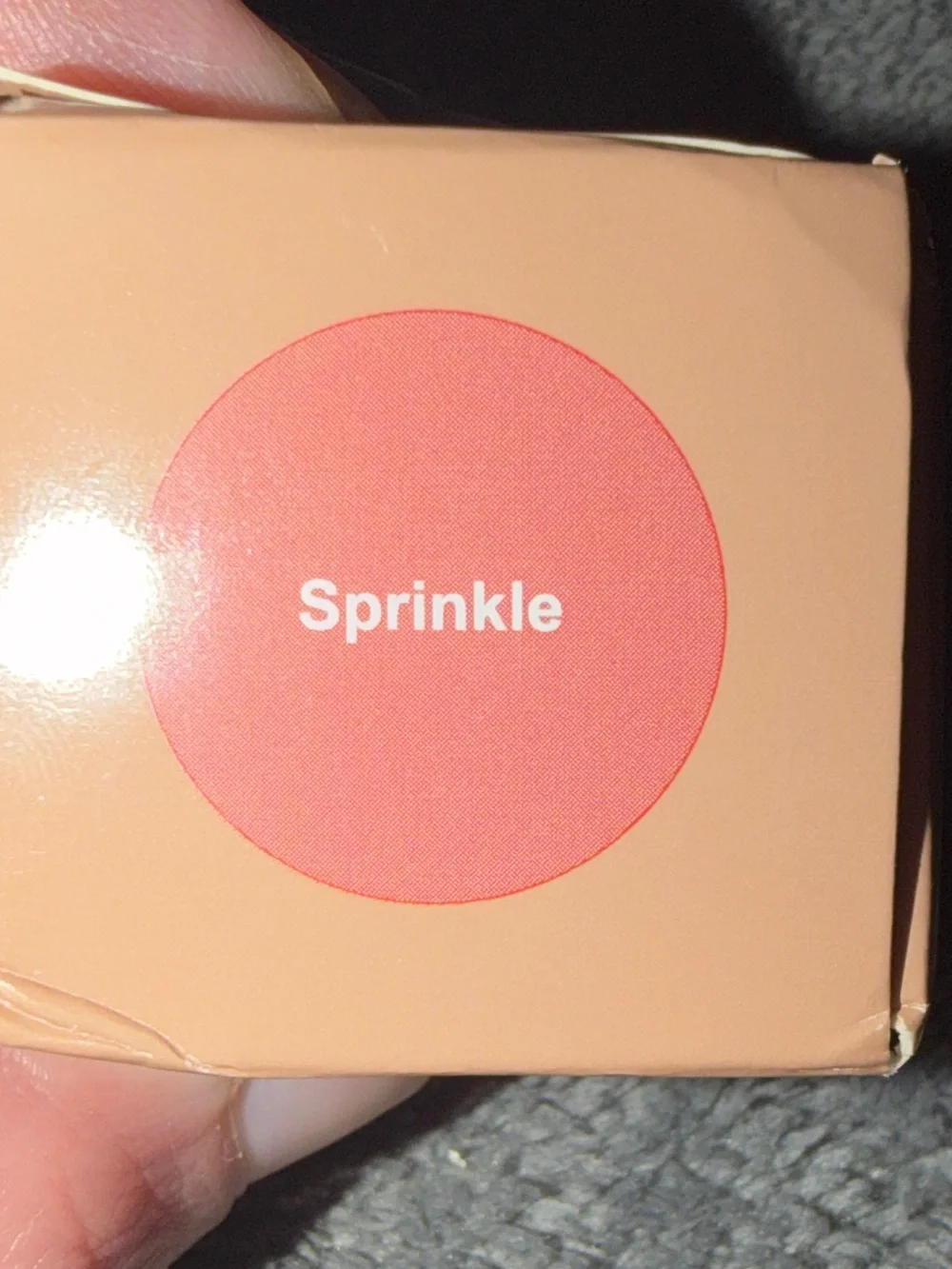 Rhode cute blush shade sprinkle . Handy to take with you and can be used for lip